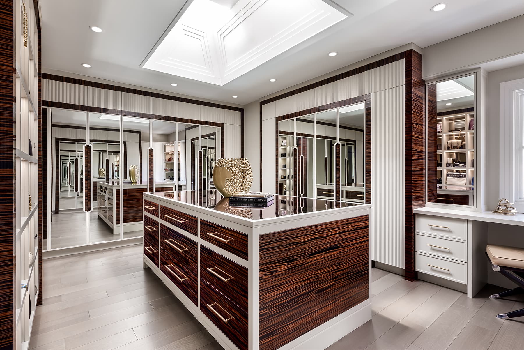 Custom dressing room with ebony macassar millwork.